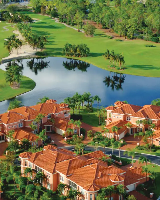 Scenic view of villas and lake