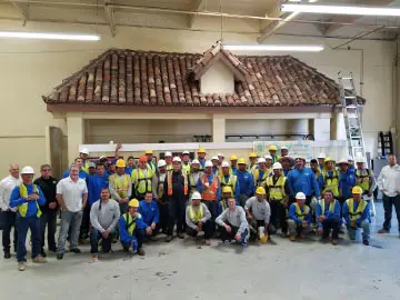 Construction team posing indoors